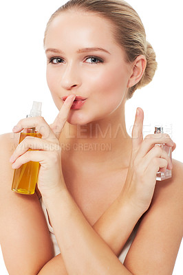 Buy stock photo Woman, makeup and face with silence, perfume and model for scent, beauty product on white background. Skin, fragrance and bottle with shine, skincare or clean for glow, cosmetology or grooming
