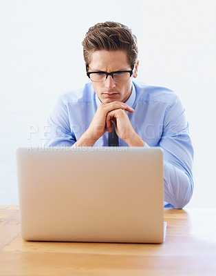 Buy stock photo Business man, confused and thinking on computer for research, online planning and investment decision. Professional analyst or trader in reading glasses, problem solving or trading solution on laptop