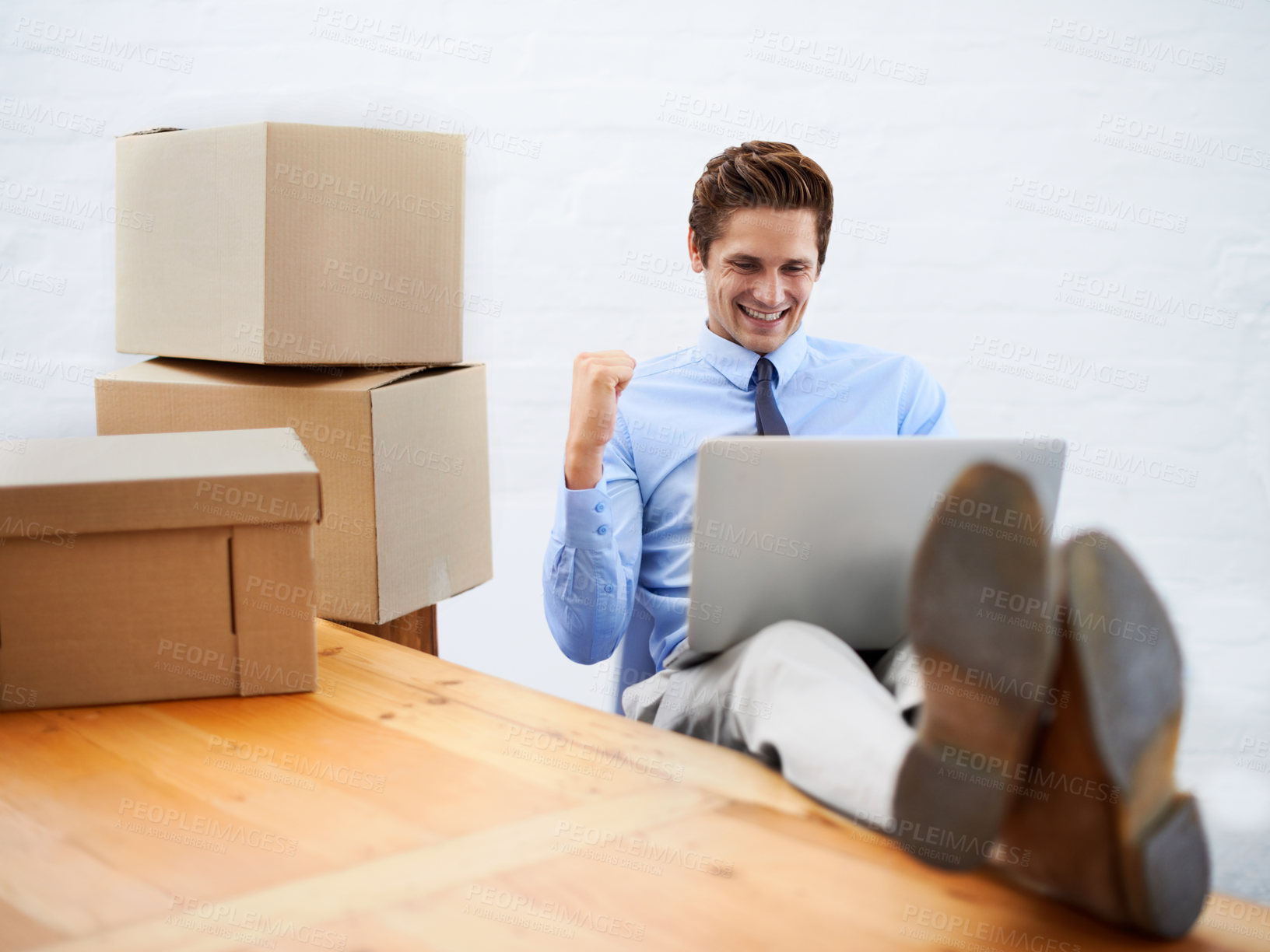 Buy stock photo Business man, celebrate and logistics in office with fist pump, laptop and online for shipping boxes. Male person, promotion and sale on delivery distribution or dropshipping, discount and package