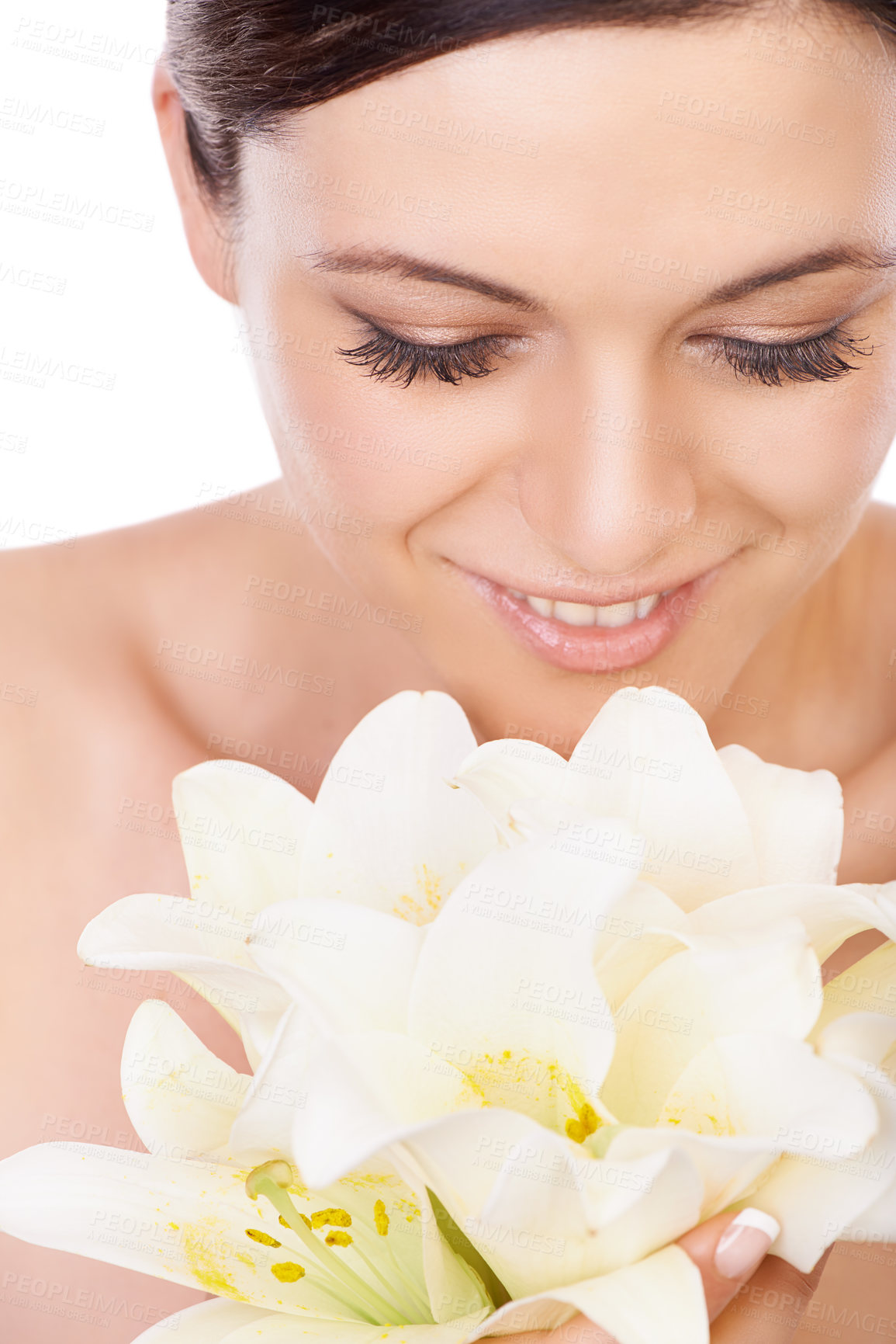 Buy stock photo Happy woman, relax and flowers for skincare beauty in cosmetics or makeup against a white studio background. Face of female person smile with nature bloom, blossom or bouquet for natural skin glow