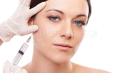 Buy stock photo Woman, portrait and needle for plastic surgery in studio for injection, chemical and product by white background. Girl patient, surgeon and syringe for change, transformation and results with beauty