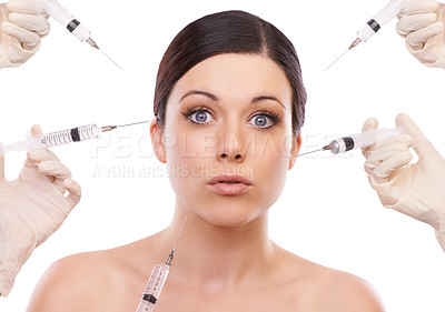 Buy stock photo Woman, portrait and syringe for plastic surgery in shock in studio, injection and chemical by white background. Girl patient, surgeon and wow for needle with change, transformation or beauty results