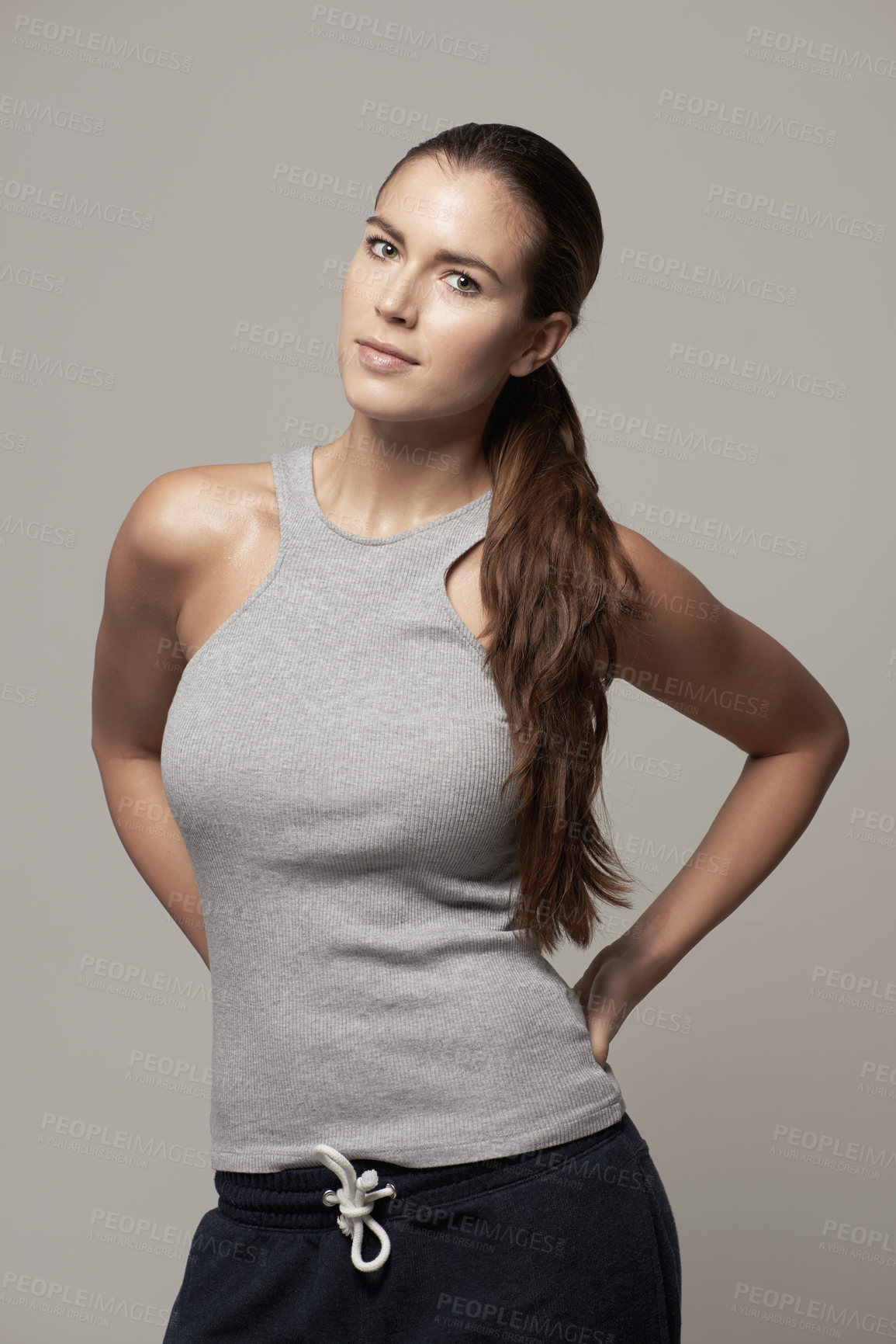 Buy stock photo Studio portrait of a fit young woman in exercise clothing