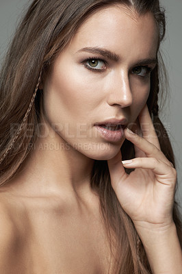 Buy stock photo Sensual, beauty and portrait of woman in studio for wellness, facial treatment and self care. Seductive, skincare and female person with natural cosmetics, makeup and satisfaction on gray background