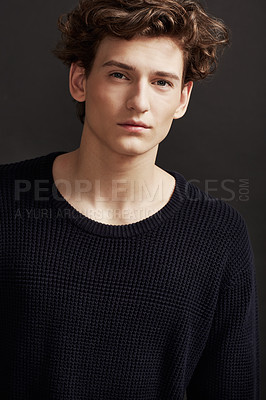 Buy stock photo Portrait of a fresh-faced young man wearing winter fashions and posing in studio