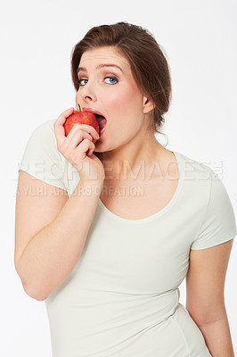 Buy stock photo Health, apple and food with portrait of woman in studio for nutrition, wellness or organic. Happy, sustainable and diet with face of female person and fruit on white background for fiber and vitamins