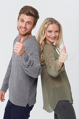 Buy stock photo Portrait, smile and couple with thumbs up for success, choice or agreement together. Happy man, woman and like hand sign, gesture or emoji in love recommendation isolated on a white studio background