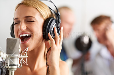 Buy stock photo Music studio, art and woman with microphone, headphones and band performance with talent. Musician, singing and happy girl singer live streaming voice for record label, sound and audio broadcast.