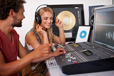 Buy stock photo Sound engineer, DJ listening and recording studio working on music, radio and audio with tech and staff. Producer, media and professional employee with synthesizer and happy from podcast industry 