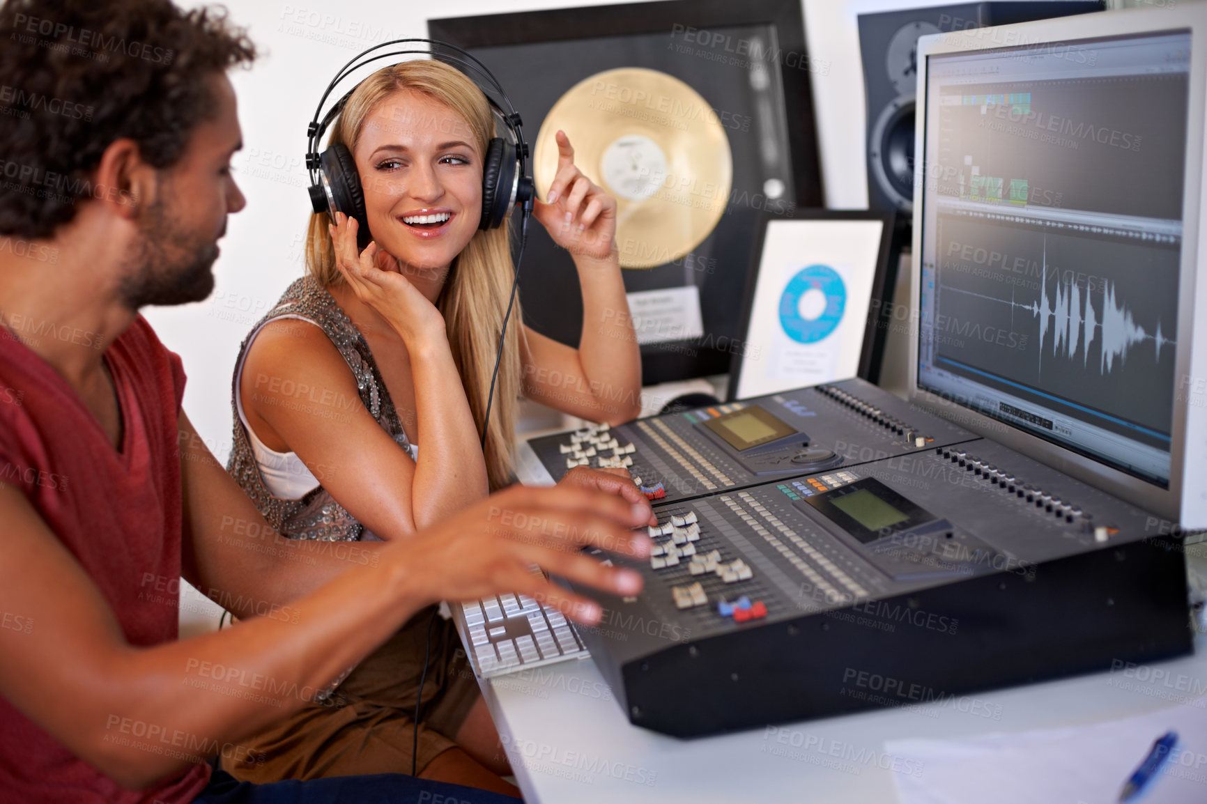 Buy stock photo Sound engineer, DJ smile and recording studio working on music, radio and audio with tech and staff. Producer, media edit and professional employee with synthesizer and happy from podcast industry 