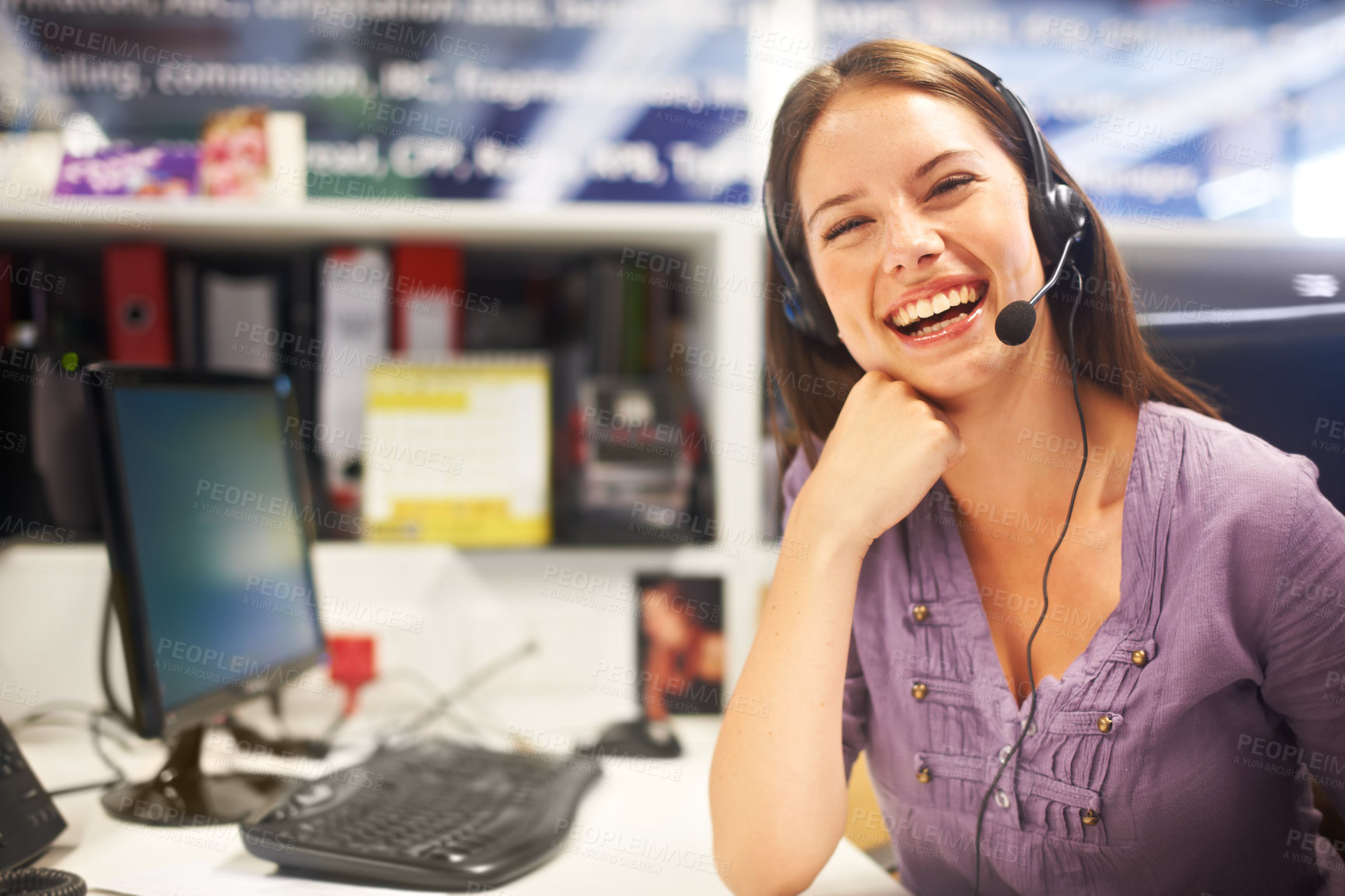 Buy stock photo Cropped portrait of a young businesswoman wearing a headset at her desk