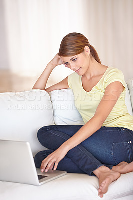 Buy stock photo Woman, laptop and relax on sofa in home to watch movies, digital news subscription or streaming multimedia. Computer, online shopping or research blog, social network or happy download in living room