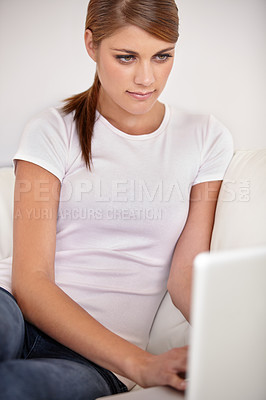 Buy stock photo Woman, relax or typing on laptop on sofa for remote work, reading blog post or social media subscription at home. Freelancer at computer for online shopping, digital download or watch movies on couch