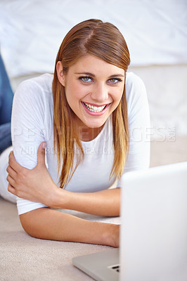 Buy stock photo Woman, remote work and portrait with laptop on floor of home to update blog post, social media and digital subscription. Happy freelancer relax with computer for online shopping, email and research
