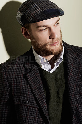 Buy stock photo Fashion, thinking and young man in a studio with classy, elegant and fancy retro outfit and hat. Serious, handsome and male person from Australia with vintage style and accessory by gray background.