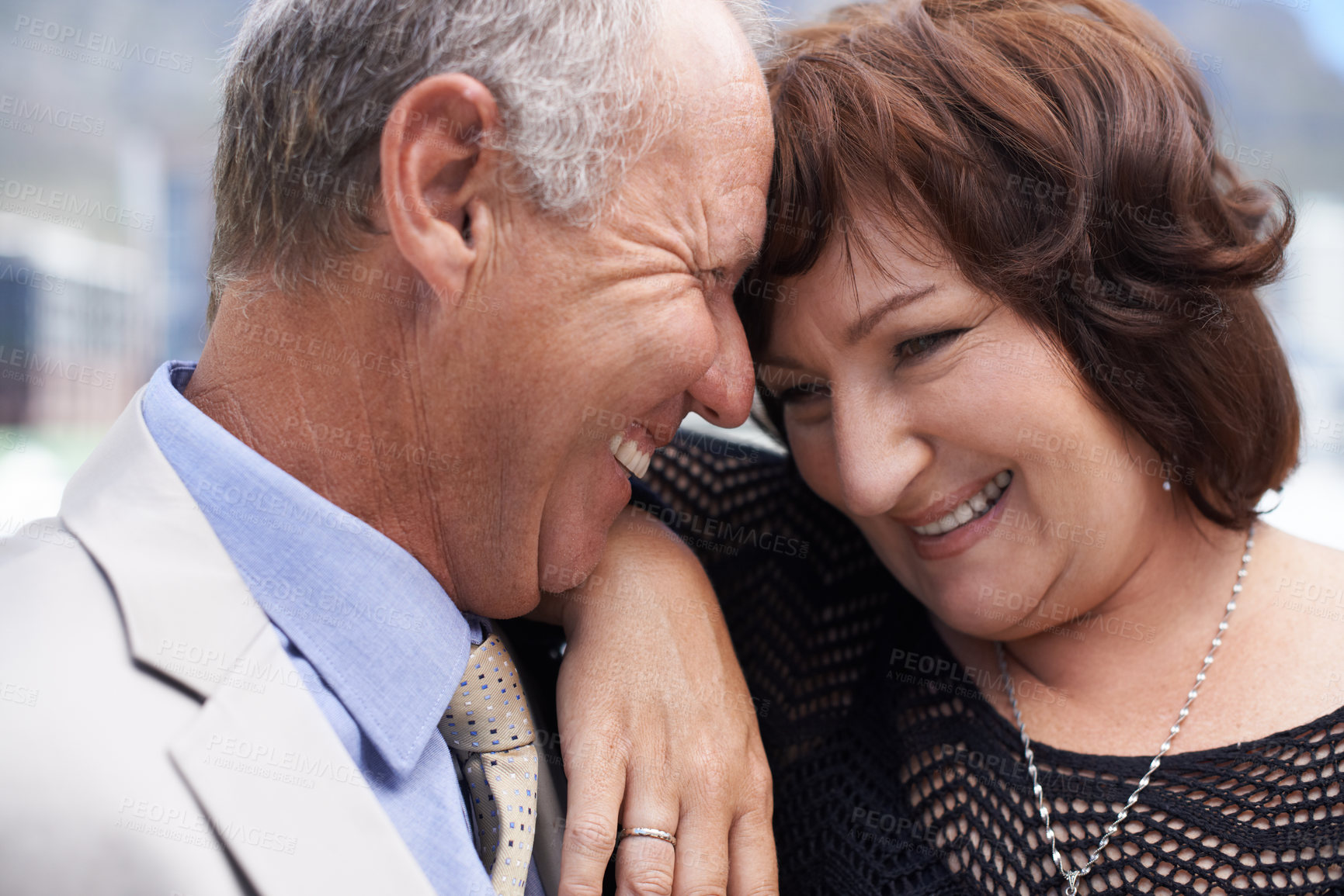 Buy stock photo Closeup of a mature couple sharing an intimate, happy moment together