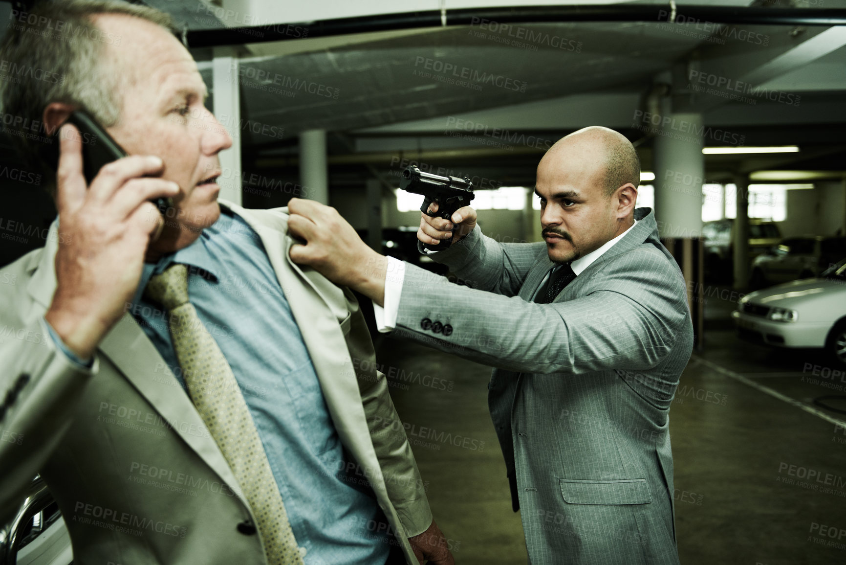 Buy stock photo Business man, parking lot and gun for crime, robbery or kidnap with horror, mafia and negotiation on a phone call. Corporate boss, manager or person talking on mobile with gangster for ransom or debt