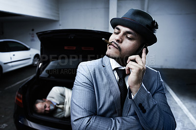 Buy stock photo Phone call, car and criminal with hostage in trunk for negotiation, kidnapping danger and crime. Mafia, gangster and business man smoking in boot for abduction, crisis and ransom in parking lot