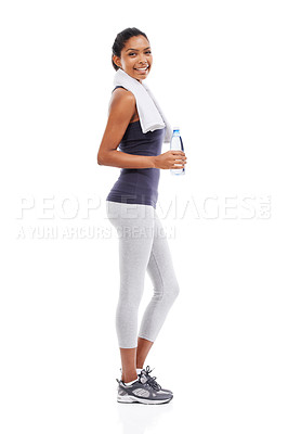 Buy stock photo Woman, fitness and exercise portrait with water and towel for workout, training and health in studio. Happy, smile and athlete with drink and bottle with break after sport with white background