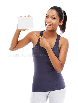Buy stock photo Woman, card and portrait of pointing to blank advertising, poster or mock up space in white background of studio. Indian, model and hand gesture to sign, post and paper for promotion or information