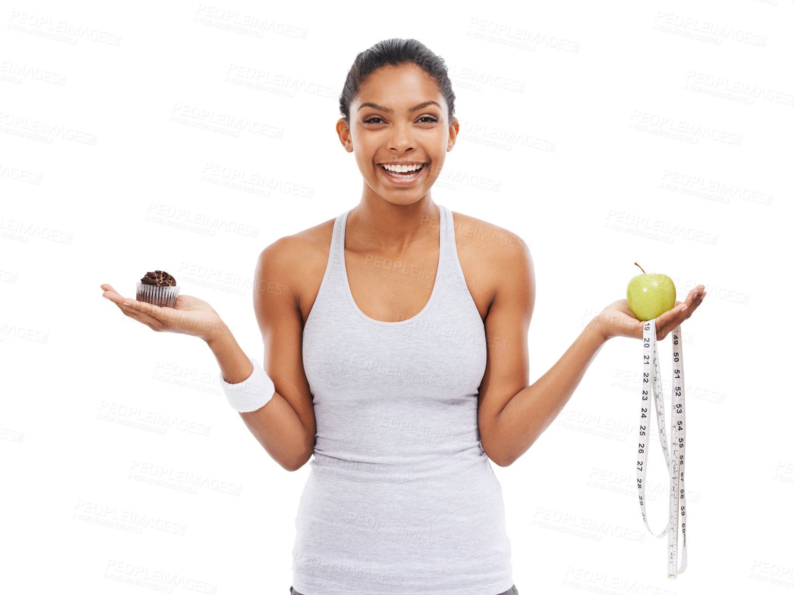 Buy stock photo Portrait, woman and decision of an apple or cupcake in studio isolated on white background for fitness. Exercise, smile and choice with a happy young athlete holding a measuring tape to lose weight 