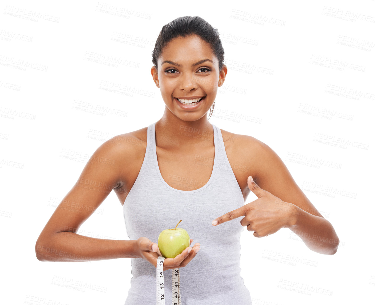 Buy stock photo Woman, pointing and lose weight with a measuring tape and apple in white background or studio. Happy, model and healthy food for results in fitness, wellness and diet with nutrition and fruit