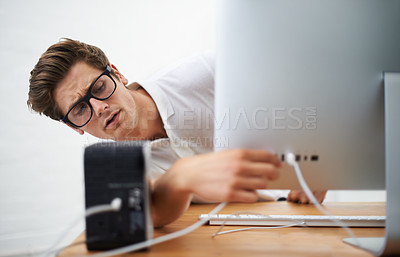 Buy stock photo Computer, man and engineer on cable connection, hardware and repair digital desktop. Pc, technician and plug wire on port of electronics, serious nerd fixing system or problem solving for info tech