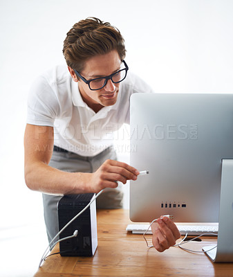 Buy stock photo Computer, man and technician on cable connection, hardware and repair digital desktop. Pc, engineer and plug wire on port of electronics, nerd fixing system and information technology professional