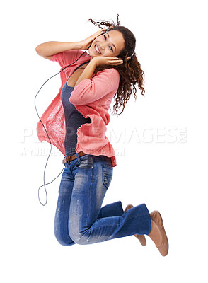 Buy stock photo Portrait, music headphones and woman jump in studio isolated on a white background mock up. Jumping, energy and happy female with hifi headset streaming, listening or enjoying podcast, radio or audio