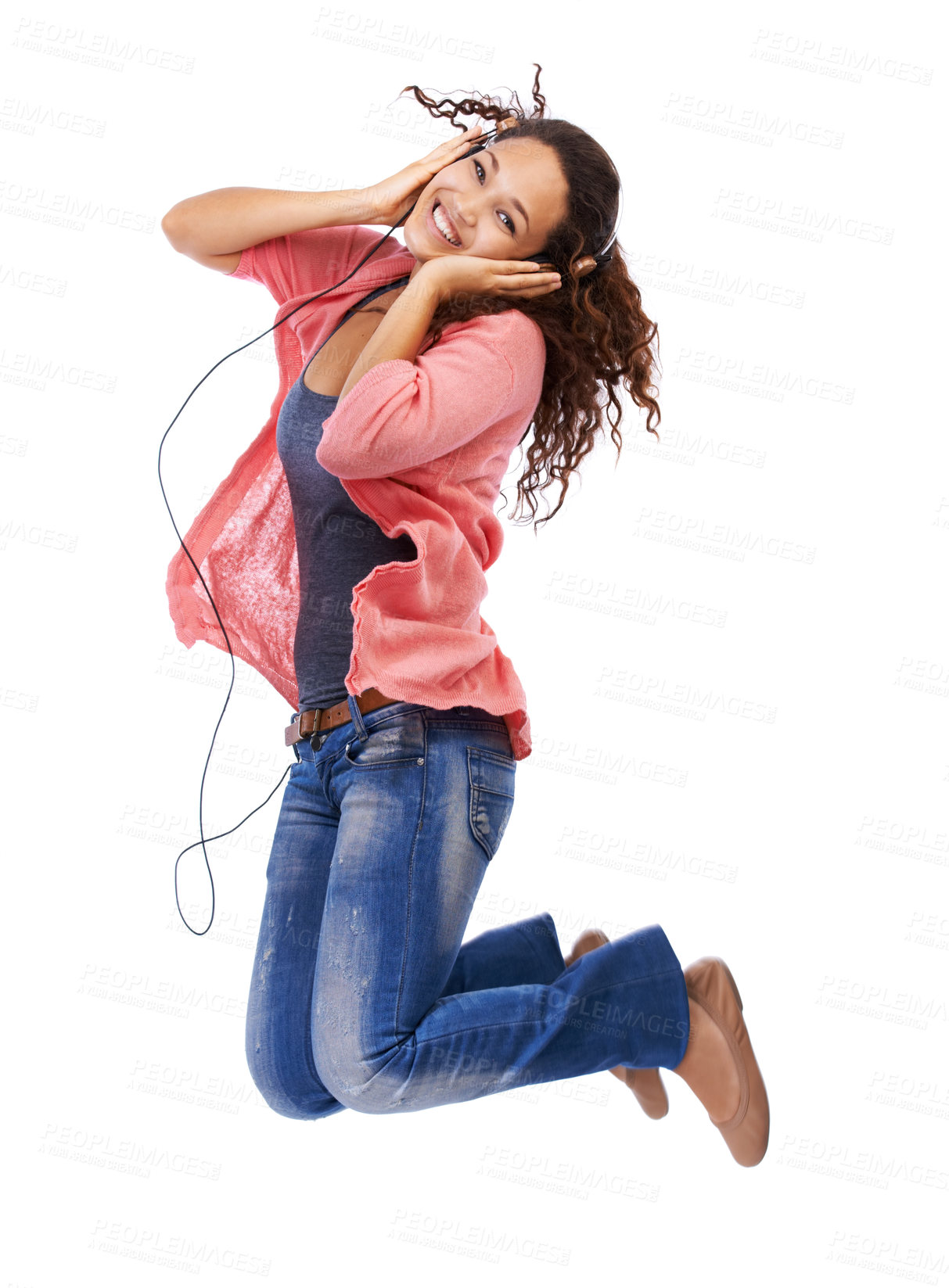 Buy stock photo Portrait, music headphones and woman jump in studio isolated on a white background mock up. Jumping, energy and happy female with hifi headset streaming, listening or enjoying podcast, radio or audio