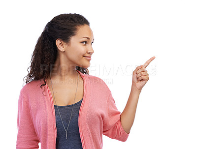 Buy stock photo Mockup, pointing and advertising with a black woman in studio on a white background for marketing blank space. Idea, product and brand with an attractive young female showing copyspace with a point