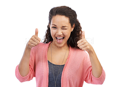 Buy stock photo Face portrait, thumbs up and wink of woman in studio isolated on a white background. Hands gesture, like emoji or happy female model with sign for success, support or approval, thank you or agreement