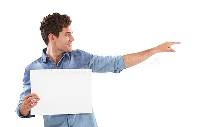 Buy stock photo Pointing, poster and young man in a studio with mockup space for marketing, promotion or advertising. Smile, happy and handsome male person from Canada with empty banner isolated by white background.