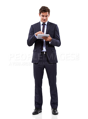 Buy stock photo Business man, studio and typing on tablet in online research, stock market investment or trading software. Professional trader or  corporate analyst scroll on digital technology on a white background
