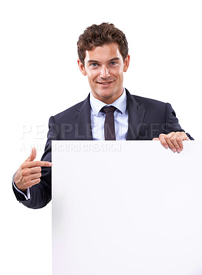 Buy stock photo Pointing, smile and businessman with poster in a studio with mockup space for marketing, promotion or advertising. Happy, handsome and male person from Canada with empty sign by white background.