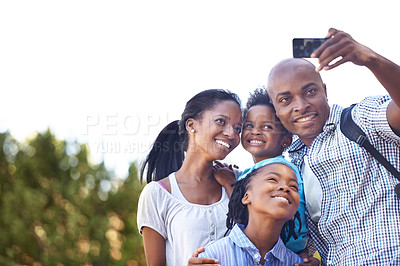 Buy stock photo Happy black family, selfie and photography in nature for hiking, bonding or outdoor photo together. African mother, children and father smile taking picture or photograph for adventure in forest