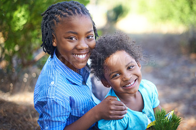 Buy stock photo Cute african american siblings spending time together in nature