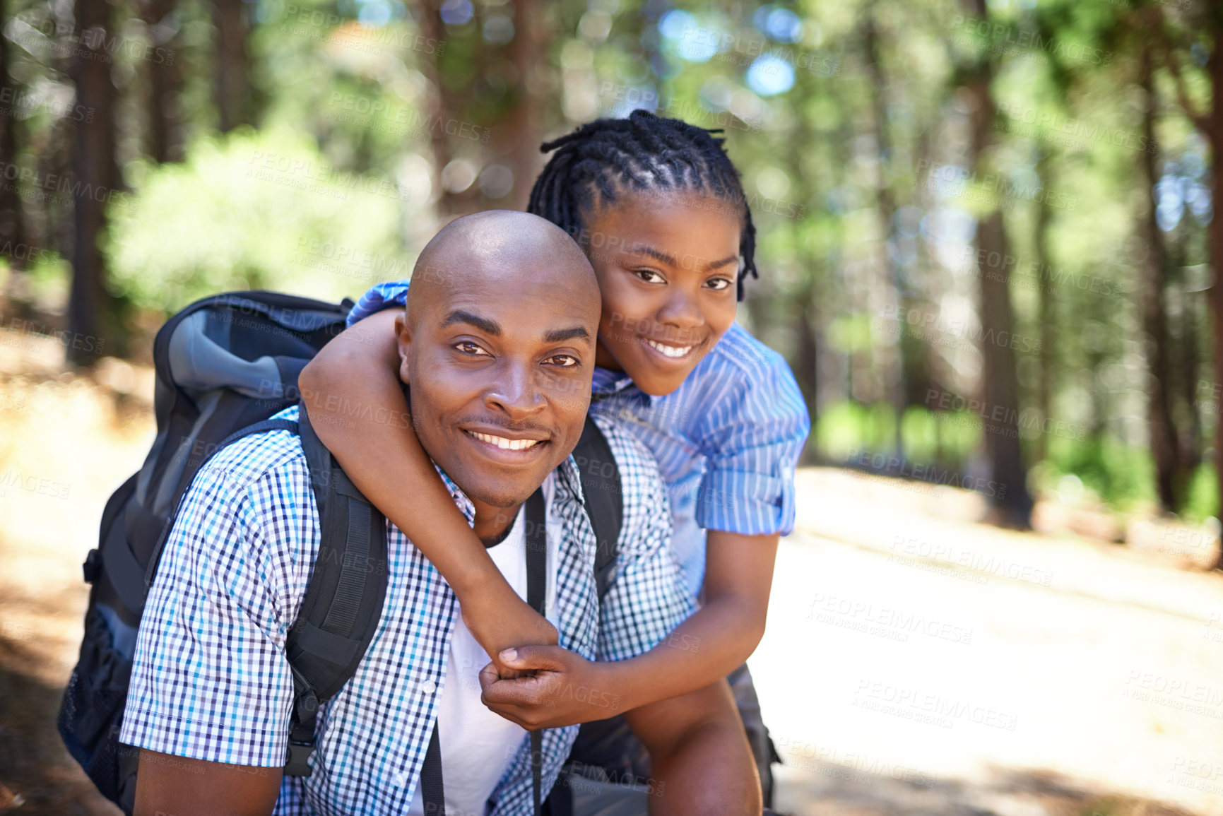 Buy stock photo Happy dad, portrait and child hug in forest for family bonding, adventure or outdoor journey in nature. African father and kid smile in embrace for fresh air, trip or hiking break outside in woods