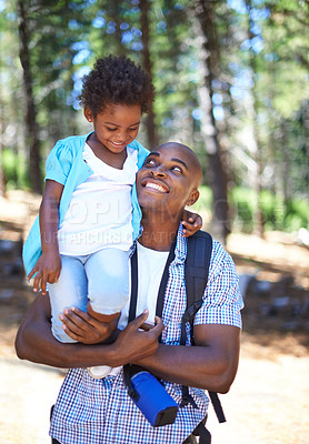 Buy stock photo Happy father, hiking and carrying child in forest for family bonding, fresh air or exploring together in nature. Dad with kid on shoulders smile in holiday adventure, weekend or outdoor trip in woods