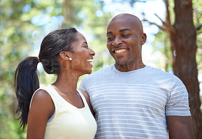 Buy stock photo Happy couple, smile and hiking nature for adventure on forest path or partnership relax, summer exercise or sunshine love. Black people, outdoor workout and trees walking for health, date or marriage