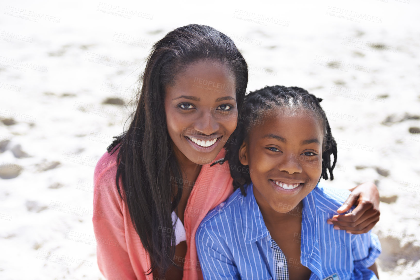 Buy stock photo Happy mom, portrait and hug with child at beach for summer holiday, break or vacation together in nature. African mother smile with kid or little boy for embrace, support or love on ocean coast