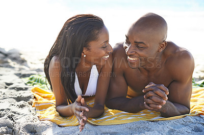 Buy stock photo Black couple on towel, beach and smile on holiday with sunshine, sand and romantic travel date. Ocean vacation, man and woman relax on bonding island adventure with love, summer and happiness at sea.