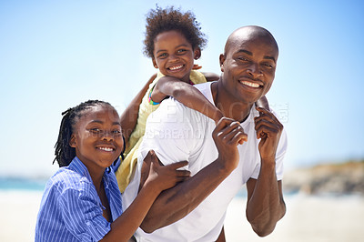 Buy stock photo Portrait, piggyback and a family on the beach in summer together for travel, freedom or vacation. Love, smile or happy with a black man, son and and daughter on the coast for holiday or getaway