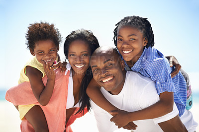 Buy stock photo An african-american family enjoying a day at the beach together