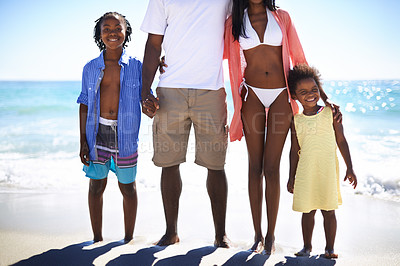 Buy stock photo Black family, parents and kids with portrait at beach for adventure, holiday and vacation in summer. African people, face and smile outdoor in nature for break, experience or bonding and relationship