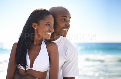 Buy stock photo Smile, love and young black couple at the beach for valentines day vacation, holiday or adventure. Happy, romance and African man and woman on a date by the ocean or sea on weekend trip together.