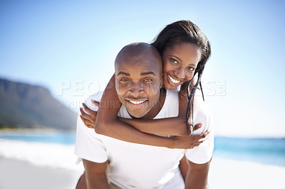 Buy stock photo Happy, piggyback and portrait of black couple at beach for valentines day vacation, holiday or adventure. Smile, love and young African man and woman on a date by the ocean on weekend trip together.