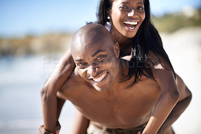 Buy stock photo Black couple, smiling and piggyback with portrait, beach and married for summer vacation. African, enjoying and happy for holiday, sun tan and seaside in outdoor, break and day off in costal city
