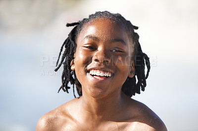 Buy stock photo Face, black boy and happiness on beach with family for adventure, holiday or vacation in summer. African kid, face and smile outdoor in nature for break, experience or bonding with shirtless with fun