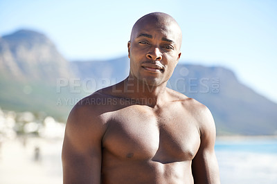 Buy stock photo Portrait of black man on beach, holiday and peace with freedom, sunshine and tropical island travel. Sea, mountain and person on ocean vacation in summer with adventure, peace and blurred background.